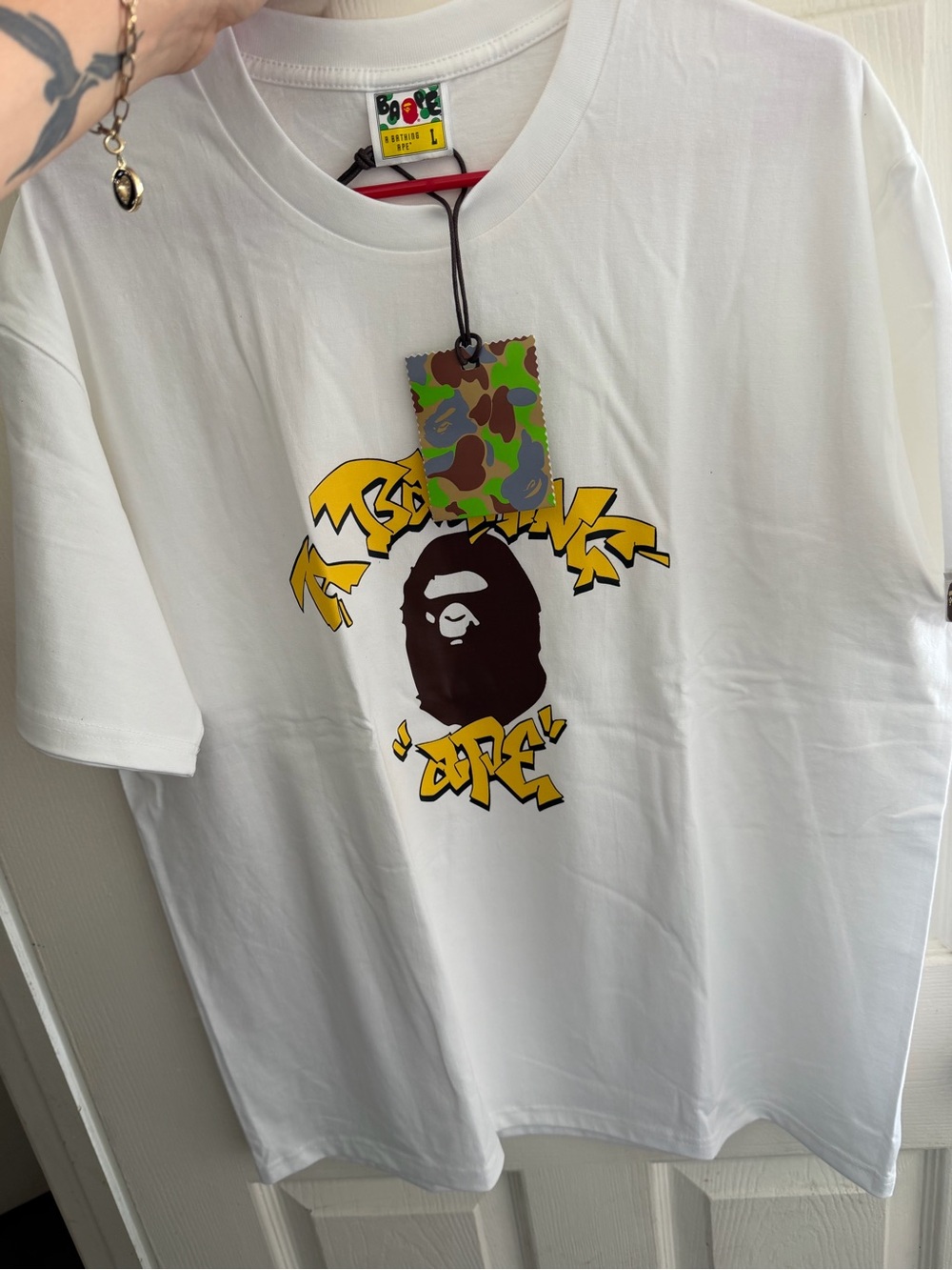 Bape White Tee with Brown Ape Head and Yellow Graffiti Accents